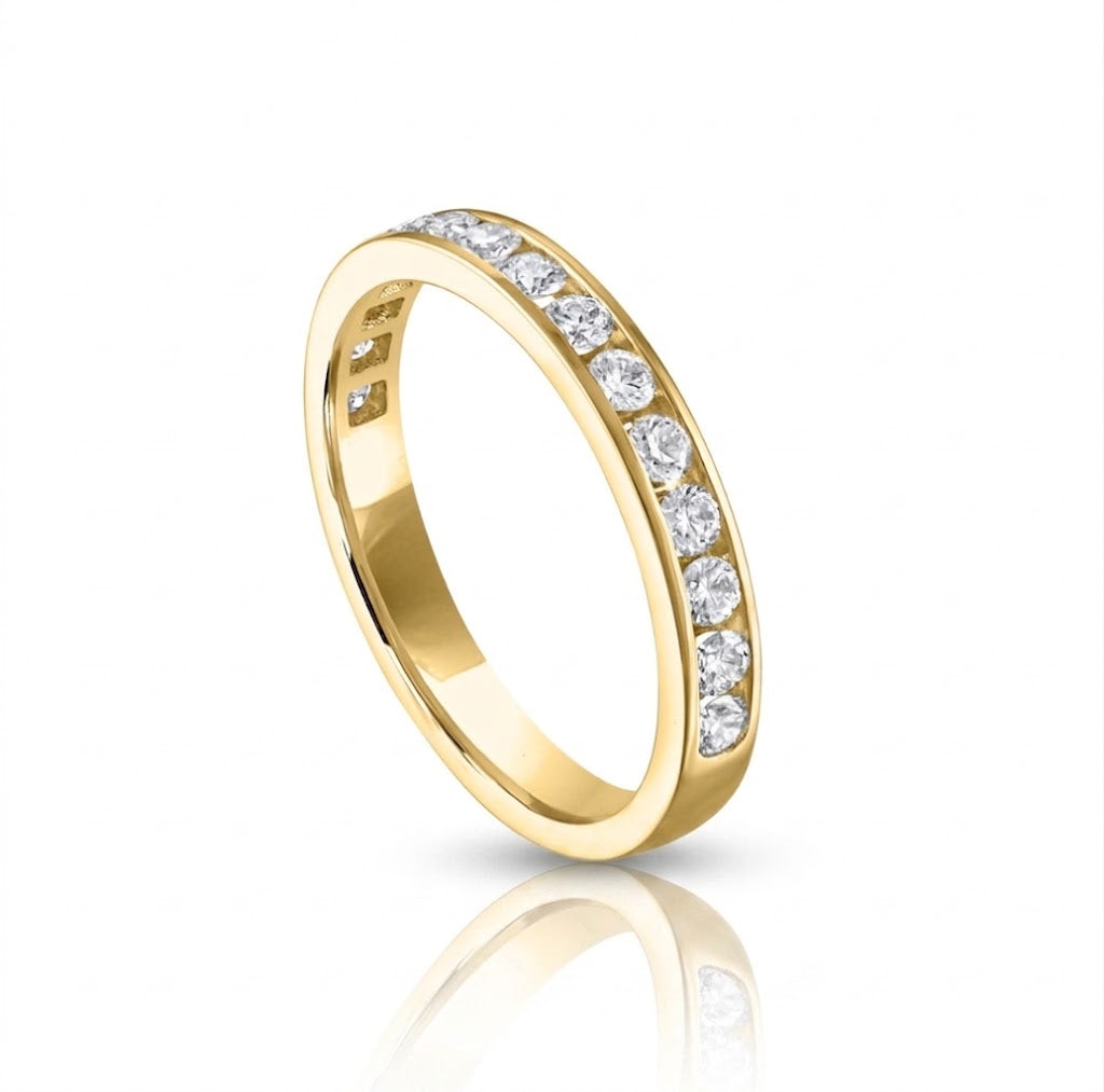 .5 Total Carat Weight Round Diamond Channel Set Wedding Band in 14K Yellow Gold