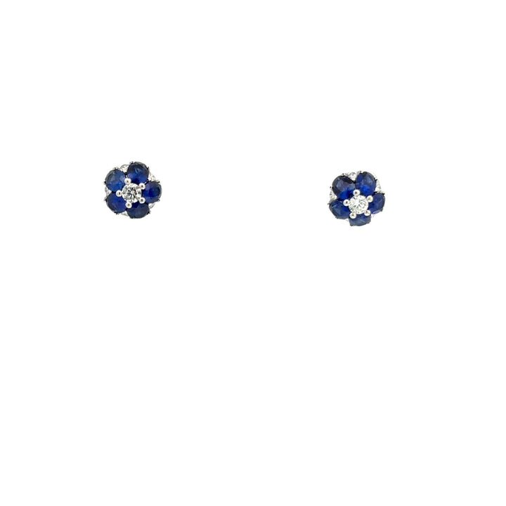Floral motif earrings diamonds and sapphires 