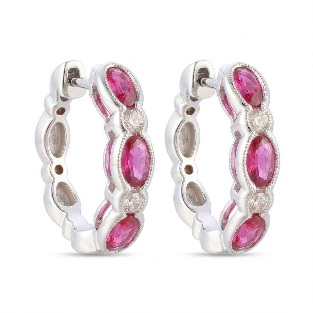 1.56 TOTAL CARAT WEIGHT OVAL RUBY AND .16 TOTAL CARAT WEIGHT ROUND DIAMOND BEZEL HUGGIE EARRINGS IN 14K WHITE GOLD