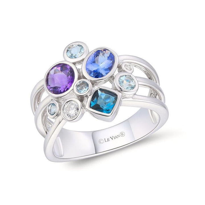 Le Vian® 14K Vanilla Gold® Multi-Gem Cluster Ring with Diamonds (1.39ctw) Colorful, artistic, and irresistibly unique—this Le Vian® cluster ring showcases a vibrant mix of gemstones, including 3/8 cts. Grape Amethyst™, 3/8 cts. Blueberry Tanzanite®, 1/3 cts. Deep Sea Blue Topaz™, and 1/4 cts. Sea Blue Aquamarine®
