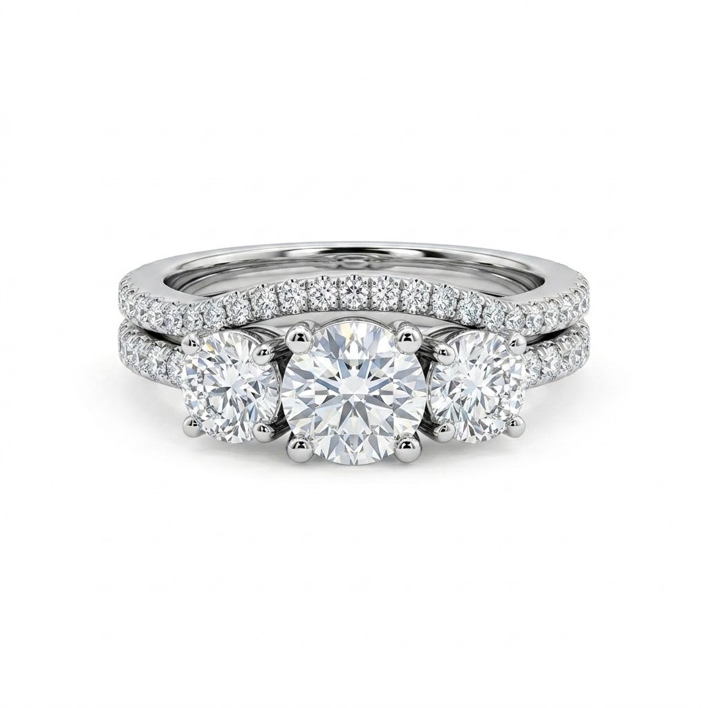 Three-Stone Diamond Bridal Set | 14K White Gold | Engagement Ring & Wedding Band Set | Three Round Diamonds | Pavé Diamond Accents - Brownee Jewelers