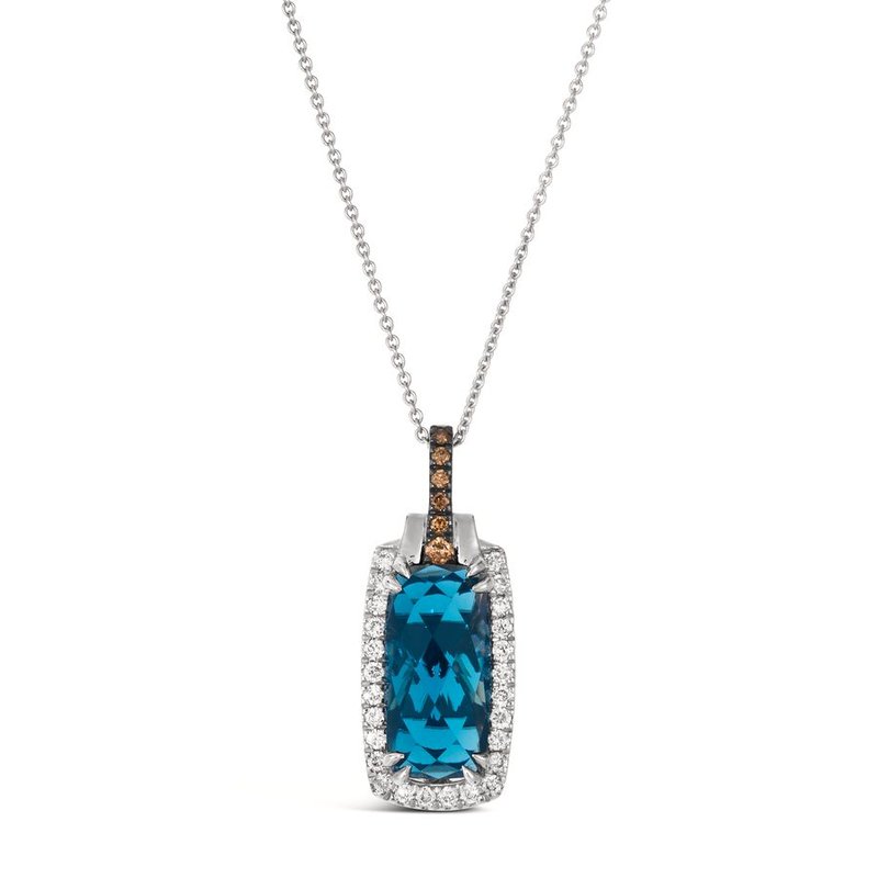 Le Vian® 14K Vanilla Gold® Deep Sea Blue Topaz™ & Diamond Pendant This stunning Le Vian® pendant highlights a vibrant 3 7/8 ct. Deep Sea Blue Topaz™, showcased in an elongated cushion shape that radiates bold ocean-blue brilliance