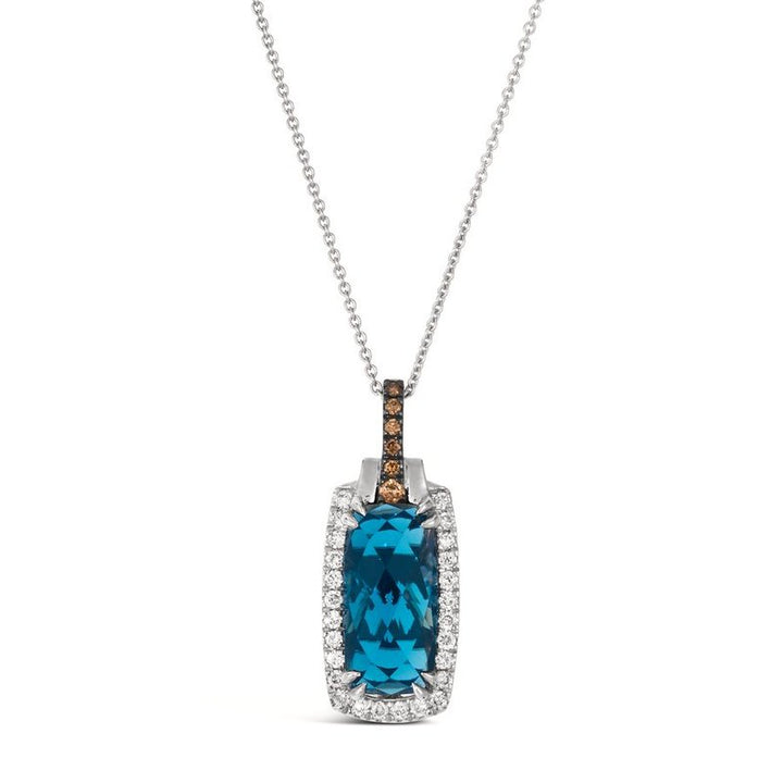 Le Vian® 14K Vanilla Gold® Deep Sea Blue Topaz™ & Diamond Pendant This stunning Le Vian® pendant highlights a vibrant 3 7/8 ct. Deep Sea Blue Topaz™, showcased in an elongated cushion shape that radiates bold ocean-blue brilliance