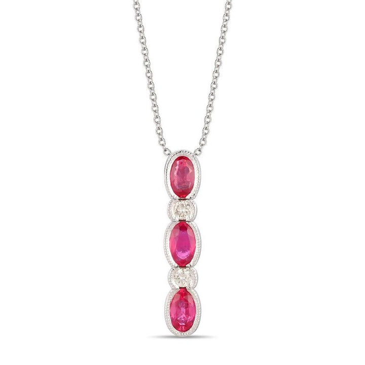 Le Vian® 14K Vanilla Gold® Passion Ruby® & Vanilla Diamond® Pendant This elegant Le Vian® pendant features a vertical trio of vivid 3/4 cts. Passion Ruby® in beautifully faceted oval cuts