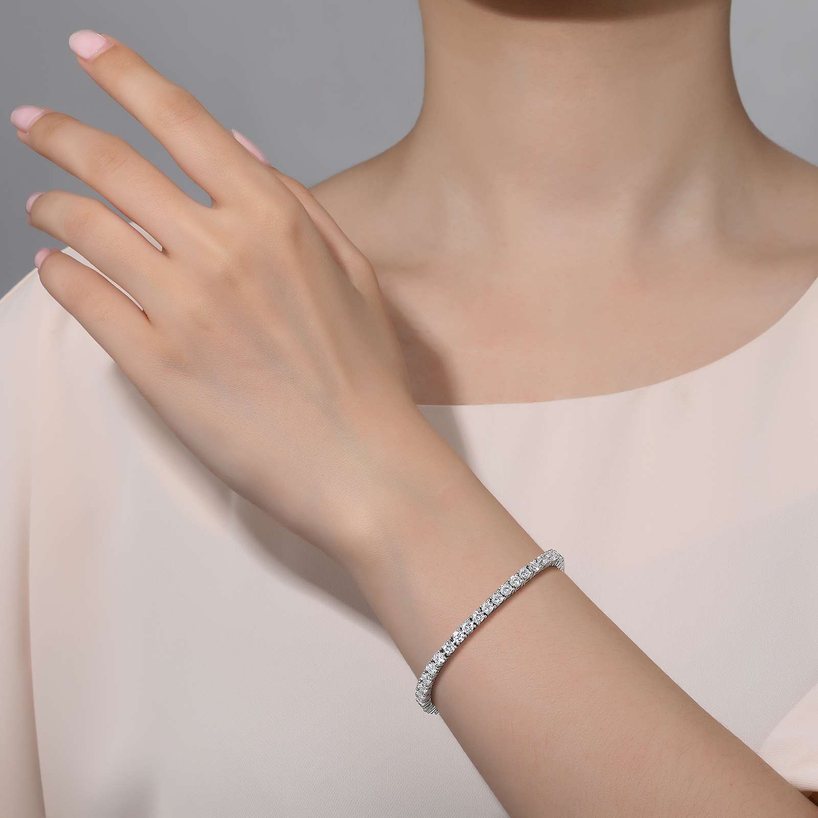Timeless classics for everyday wear. This tennis bracelet is set with Lafonn's signature Lassaire simulated diamonds in sterling silver bonded with platinum.