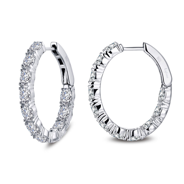 Fun and elegant. These inside out oval hoop earrings are set with Lafonn's signature Lassaire simulated diamonds in sterling silver bonded with platinum. 20 mm x 25 mm Oval.