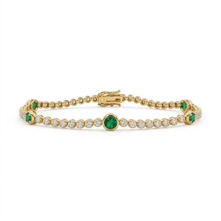 14kt yellow gold diamond and emerald tennis bracelet 