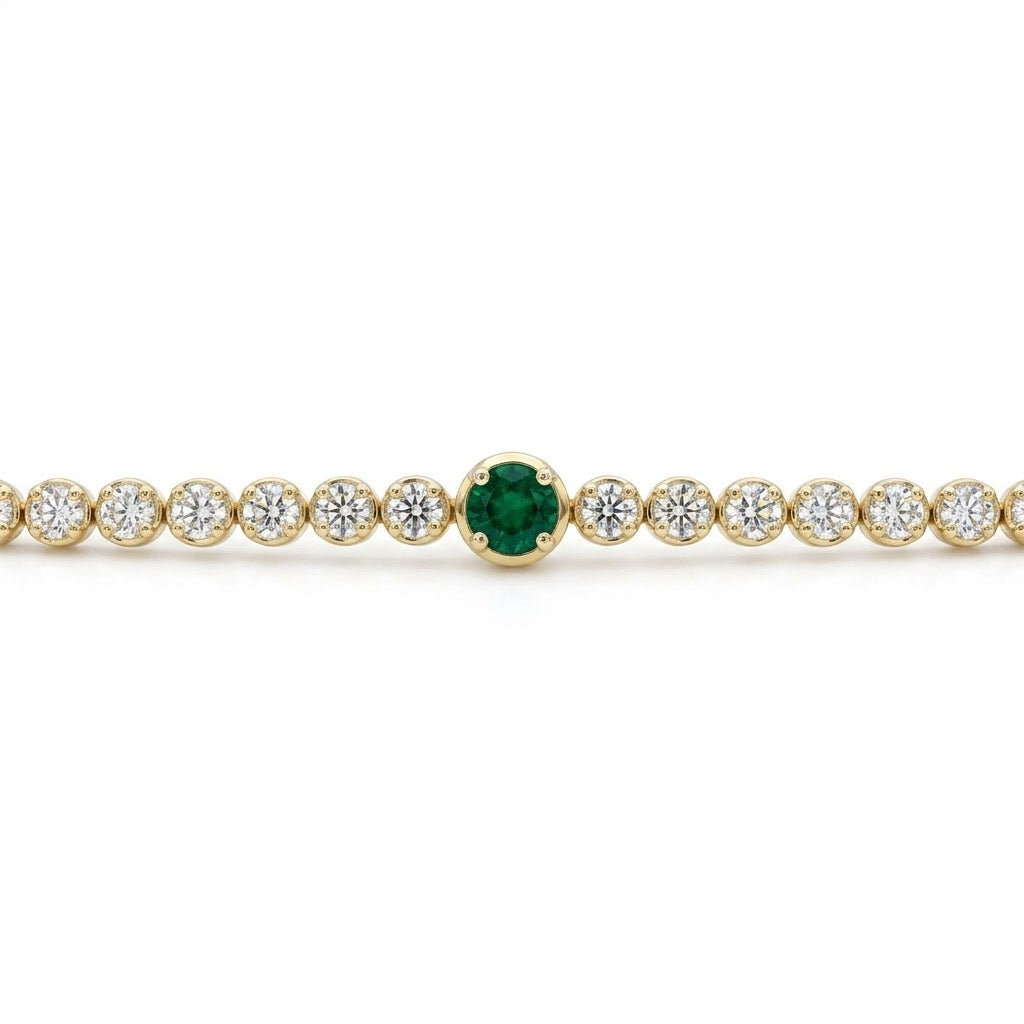 14kt yellow gold diamond and emerald tennis bracelet 