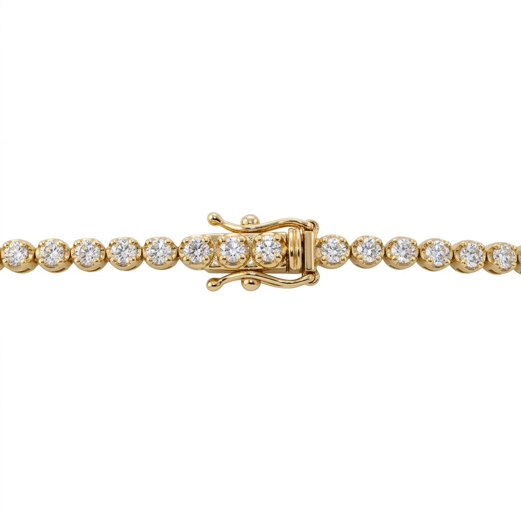 14kt yellow gold diamond and emerald tennis bracelet 