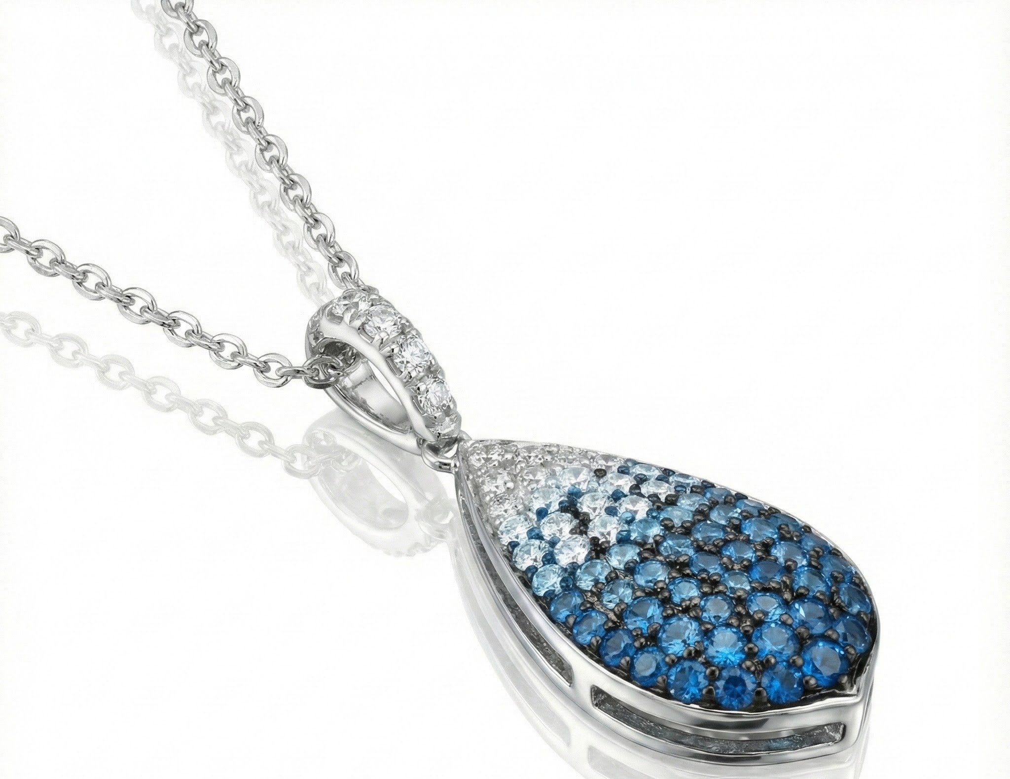 Le Vian Ombre® 14K Vanilla Gold® Pendant with Denim Ombré® Sapphire & Vanilla Sapphire™ A stunning blend of color and sparkle, this Le Vian Ombre® pendant features a graceful teardrop silhouette crafted in luminous 14K Vanilla Gold®