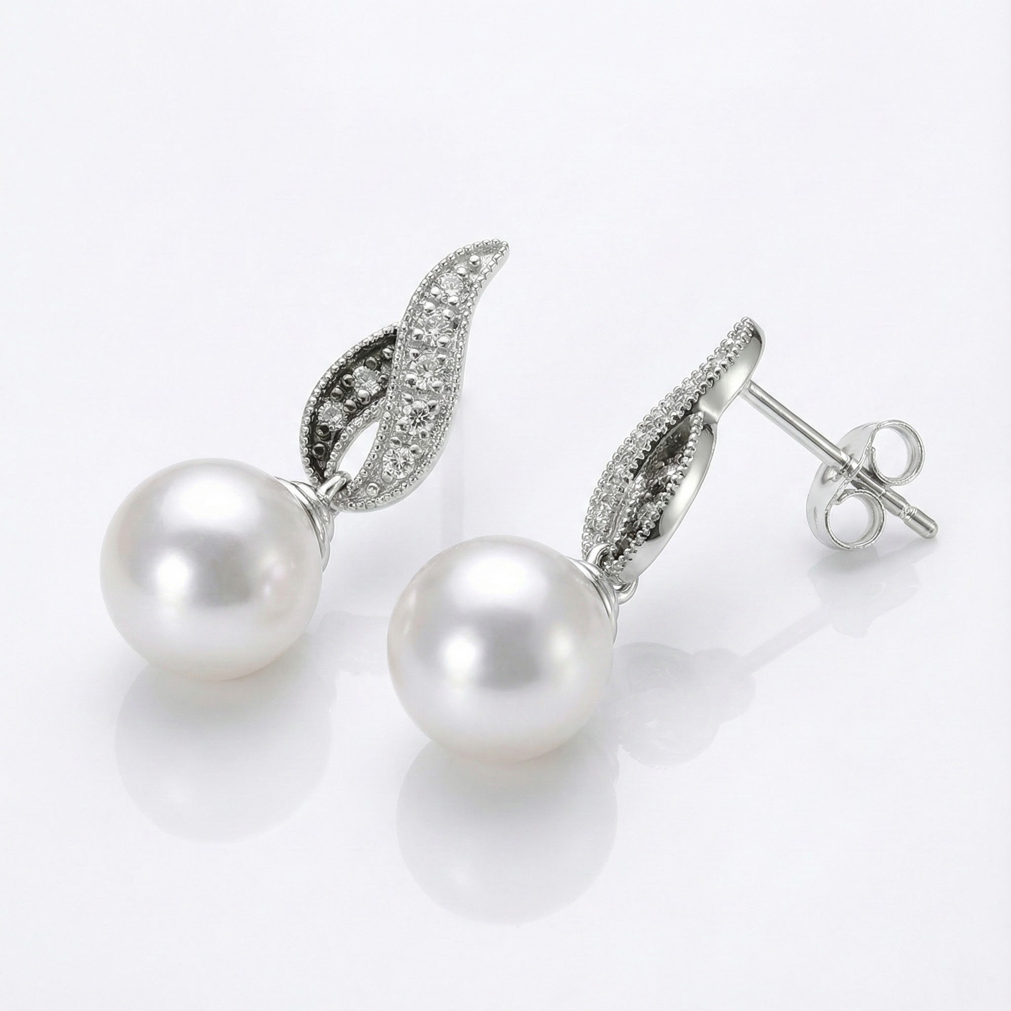 Le Vian® Vanilla Pearl & Diamond Drop Earrings – 14K Vanilla Gold® Graceful and luminous, these elegant drop earrings by Le Vian showcase glowing Vanilla Pearls™ suspended beneath sculpted diamond-accented motifs