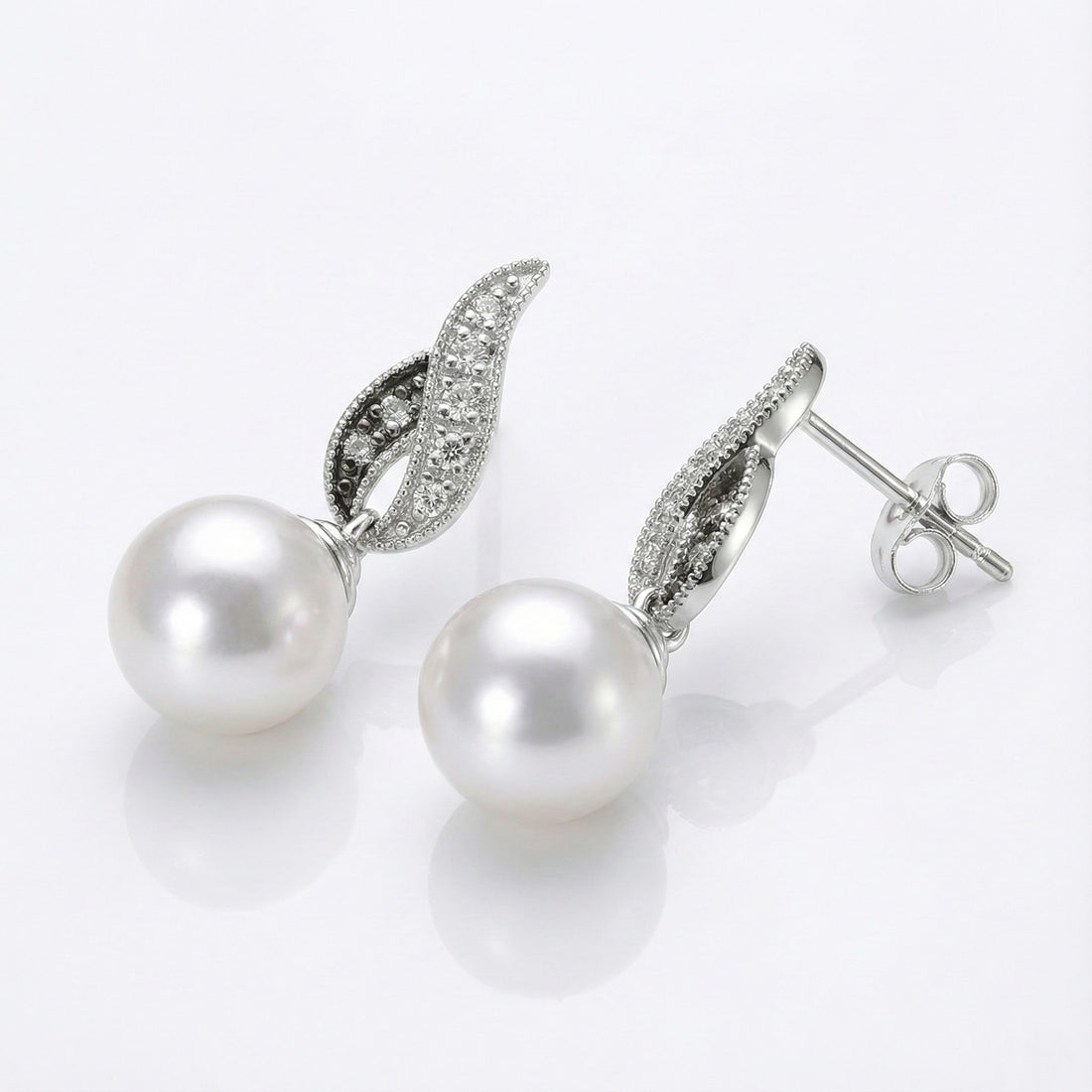 Le Vian® Vanilla Pearl & Diamond Drop Earrings – 14K Vanilla Gold® Graceful and luminous, these elegant drop earrings by Le Vian showcase glowing Vanilla Pearls™ suspended beneath sculpted diamond-accented motifs