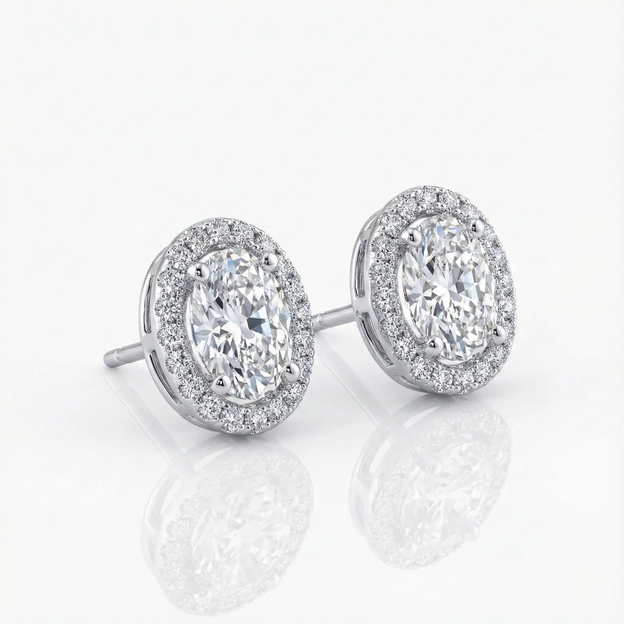 Oval CZ Halo Stud Earrings | Sterling Silver | Cubic Zirconia - Brownee Jewelers