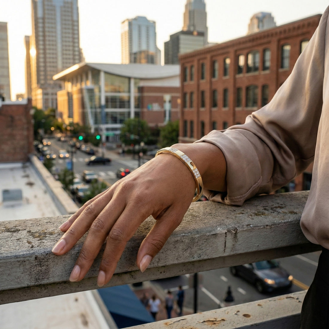 Le Vian® 14K Honey Gold™ Nude Diamond™ Bangle (1/2 ctw) This elegant Le Vian® bangle showcases 1/2 carat of Nude Diamonds™ arranged in three shimmering diamond-accented stations.