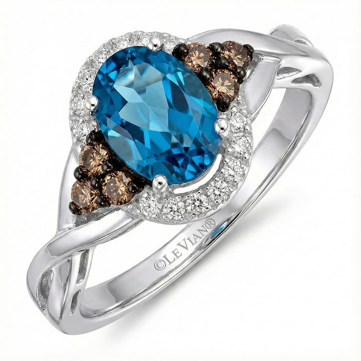 Le Vian® Chocolatier® Royal Blues Ring – 14K Two-Tone Gold Indulge in signature luxury with this stunning Le Vian Chocolatier® Royal Blues ring, showcasing a vivid oval blue topaz framed by rich Chocolate Diamonds®