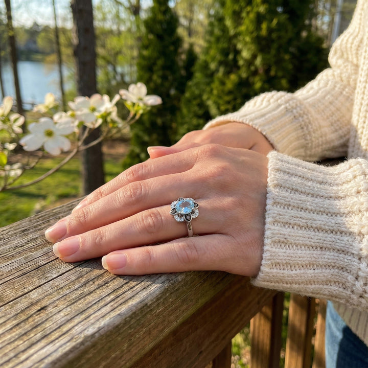 Le Vian® 14K Vanilla Gold® Sea Blue Aquamarine® & Diamond Ring This captivating Le Vian® design features a luminous 7/8 ct. Sea Blue Aquamarine® as the centerpiece, showcased in an elegant floral-inspired halo