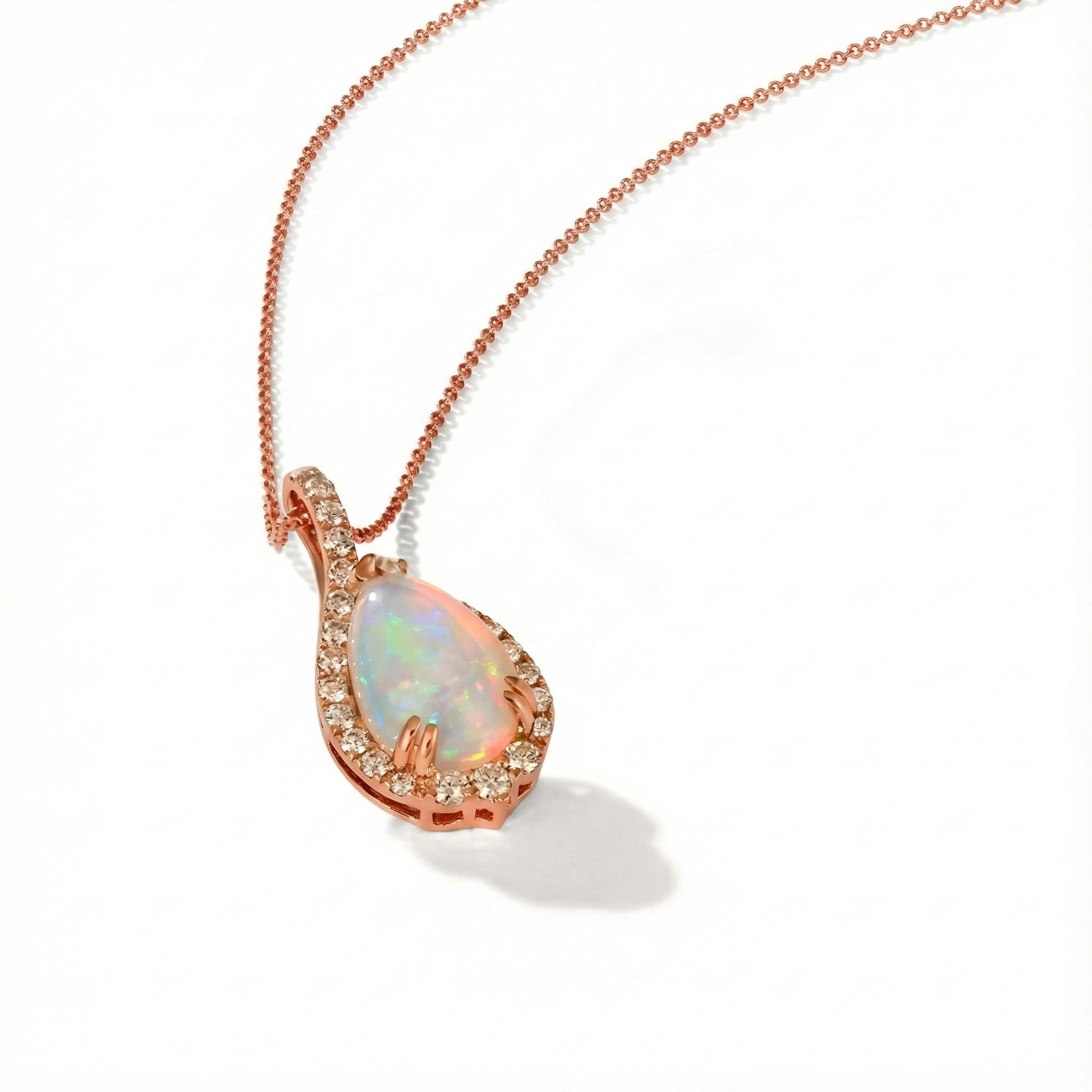 Le Vian® 14K Strawberry Gold® Neopolitan Opal® & Nude Diamond™ Pendant (2.85ctw) Ethereal, romantic, and unmistakably Le Vian®—this stunning pendant features a glowing 2 1/5 ct. Neopolitan Opal® radiating soft pastel flashes