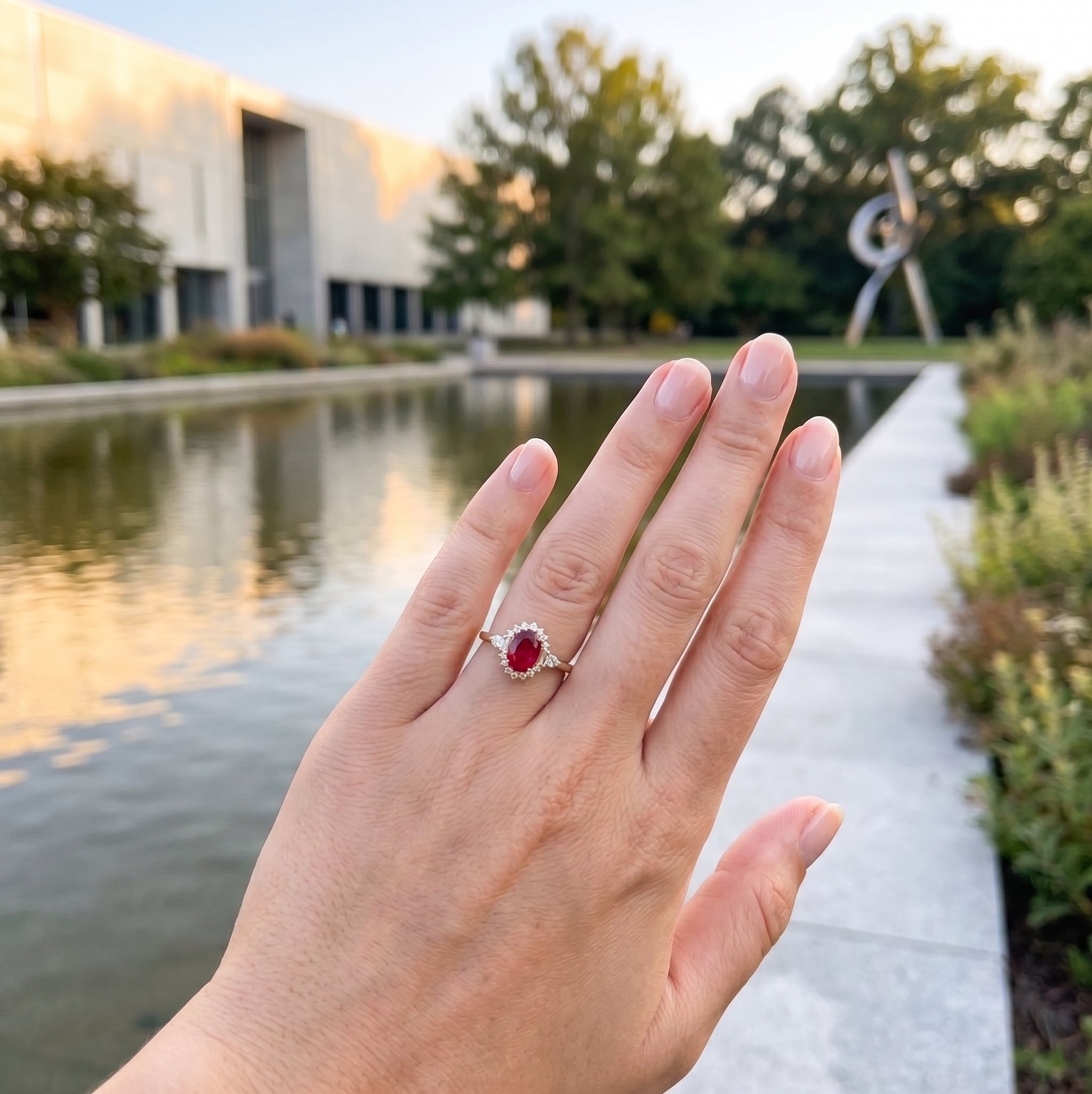 Oval Ruby & Lab-Grown Diamond Halo Ring | 1.65 ct Ruby | 0.40 ctw Diamonds | 10K Yellow Gold - Brownee Jewelers