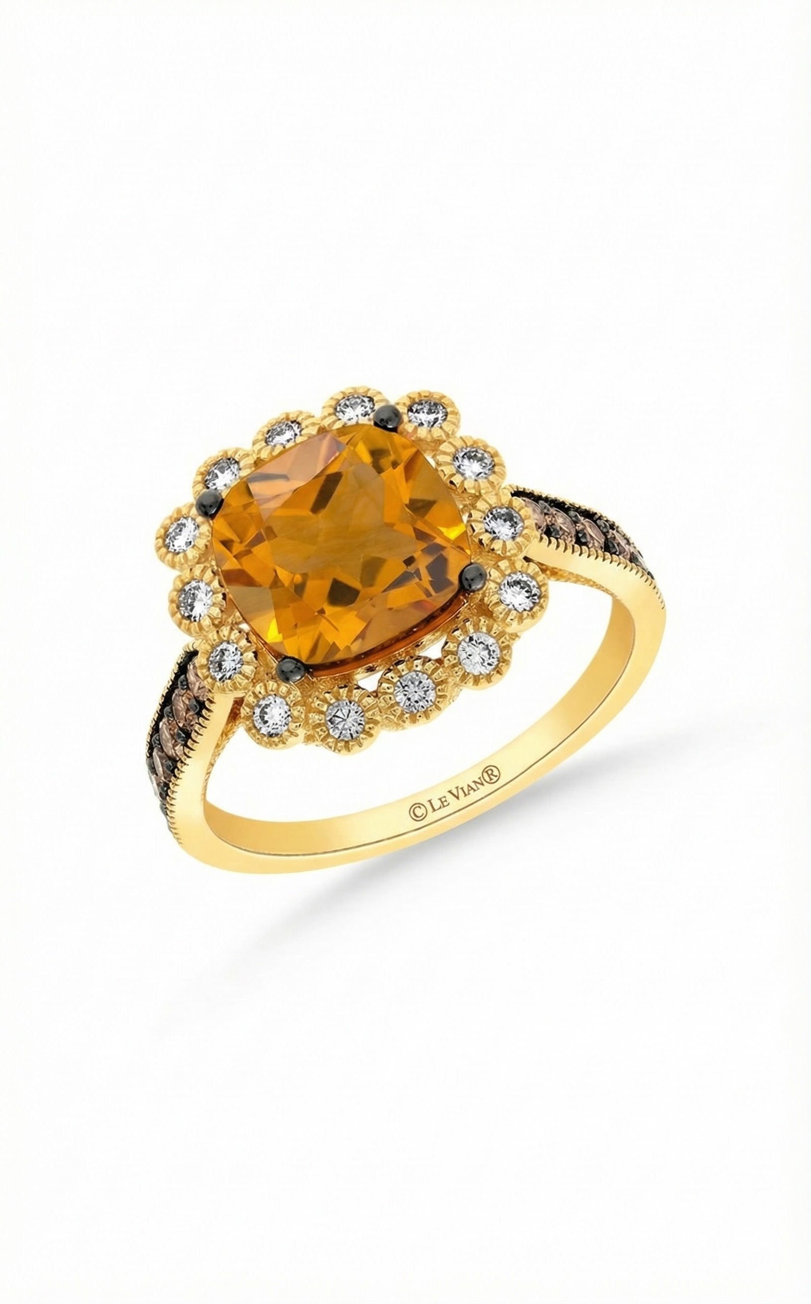 14K Yellow Gold Le Vian® Cinnamon Citrine® & Diamond Halo Ring This radiant Le Vian® ring showcases a vibrant cushion-cut Cinnamon Citrine® framed by a sparkling halo of white diamonds