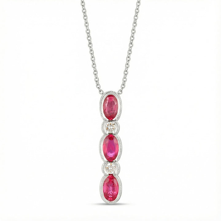Le Vian® 14K Vanilla Gold® Passion Ruby® & Vanilla Diamond® Pendant This elegant Le Vian® pendant features a vertical trio of vivid 3/4 cts. Passion Ruby® in beautifully faceted oval cuts