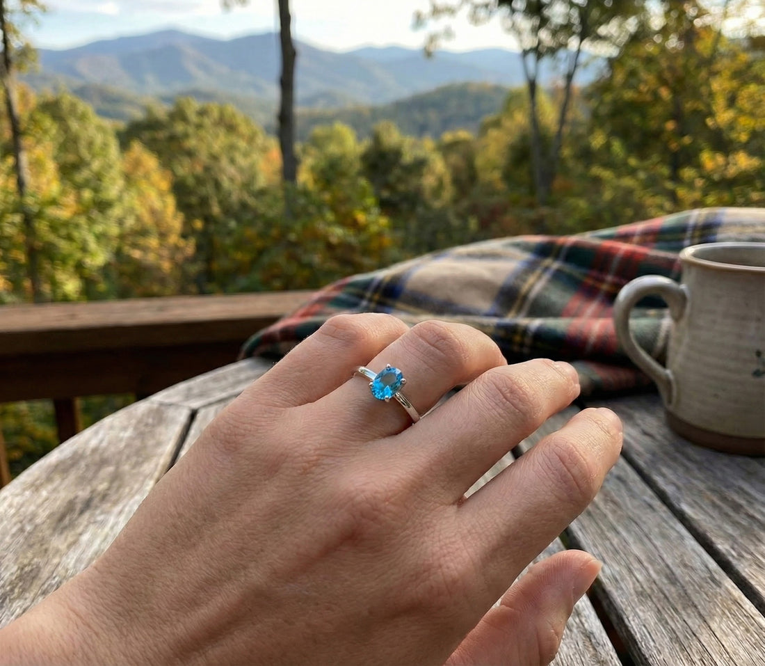 Oval Blue Topaz Solitaire Ring | 14K White Gold | 8×6 mm | Size 7 | - Brownee Jewelers