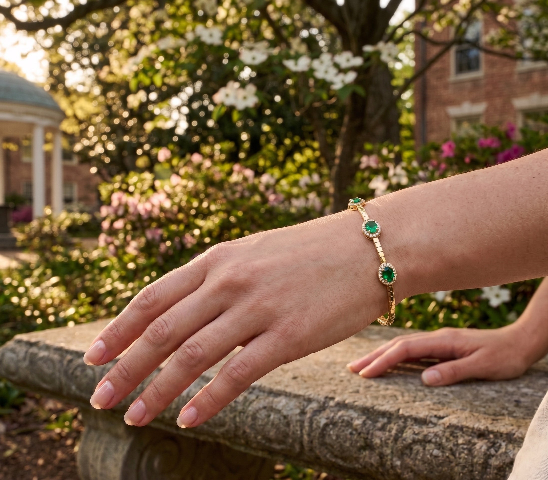 Emerald Halo Bangle | 14K Yellow Gold | Oval Emerald & Diamond Bangle Bracelet | 1.16CT Emerald & .255CT Diamond Accent - Brownee Jewelers