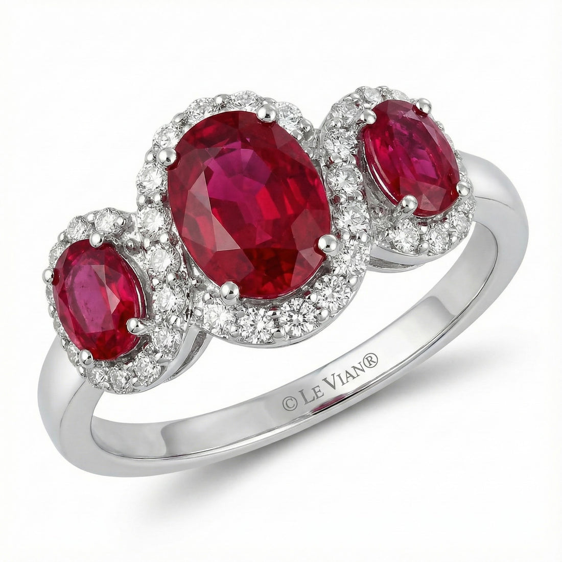 Le Vian® 14K Vanilla Gold® Passion Ruby® & Vanilla Diamond® Ring (1.05ctw) This stunning Le Vian® three-stone ring showcases 7/8 cts. of vivid Passion Ruby® gemstones wrapped in shimmering 1/5 cts