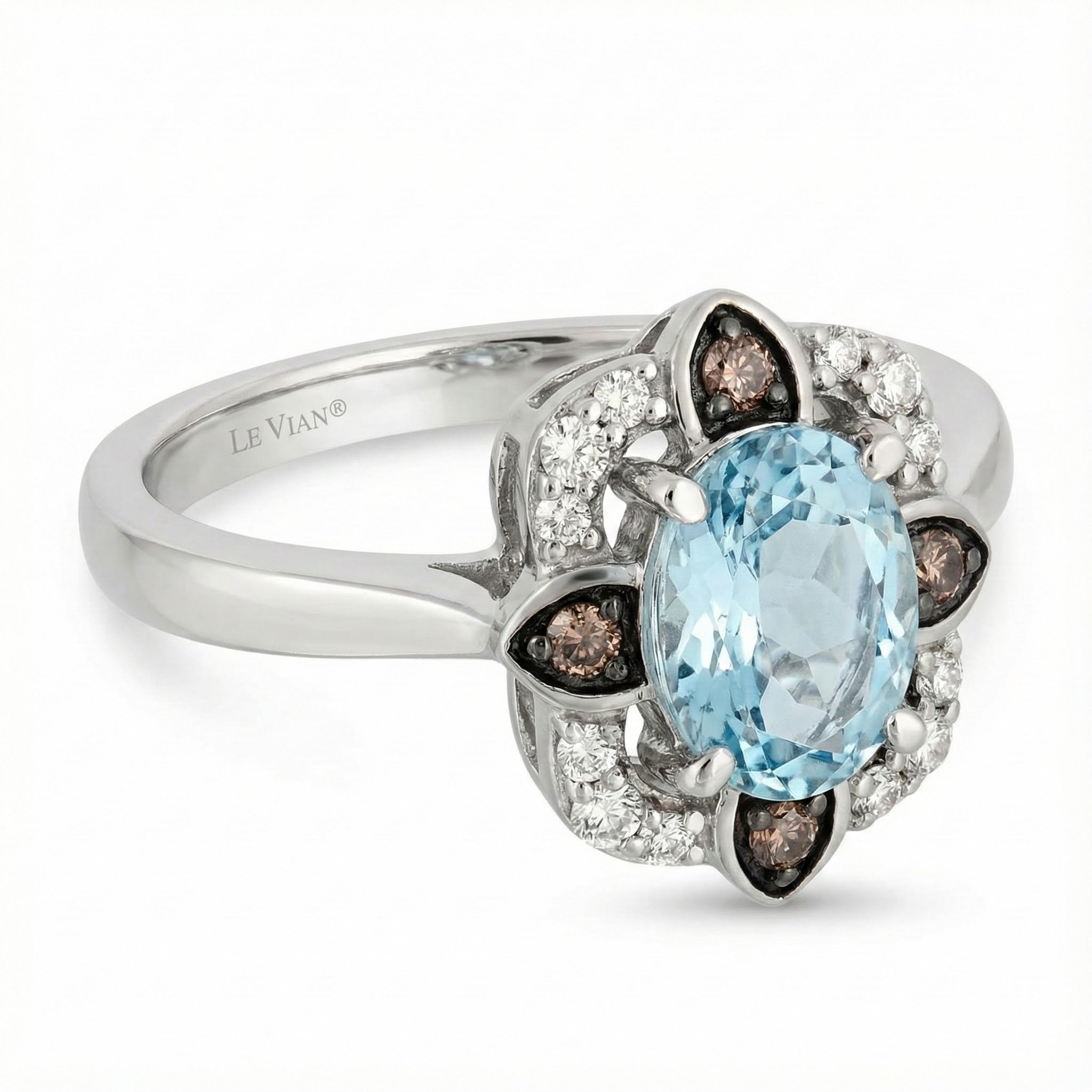 Le Vian® 14K Vanilla Gold® Sea Blue Aquamarine® & Diamond Ring This captivating Le Vian® design features a luminous 7/8 ct. Sea Blue Aquamarine® as the centerpiece, showcased in an elegant floral-inspired halo