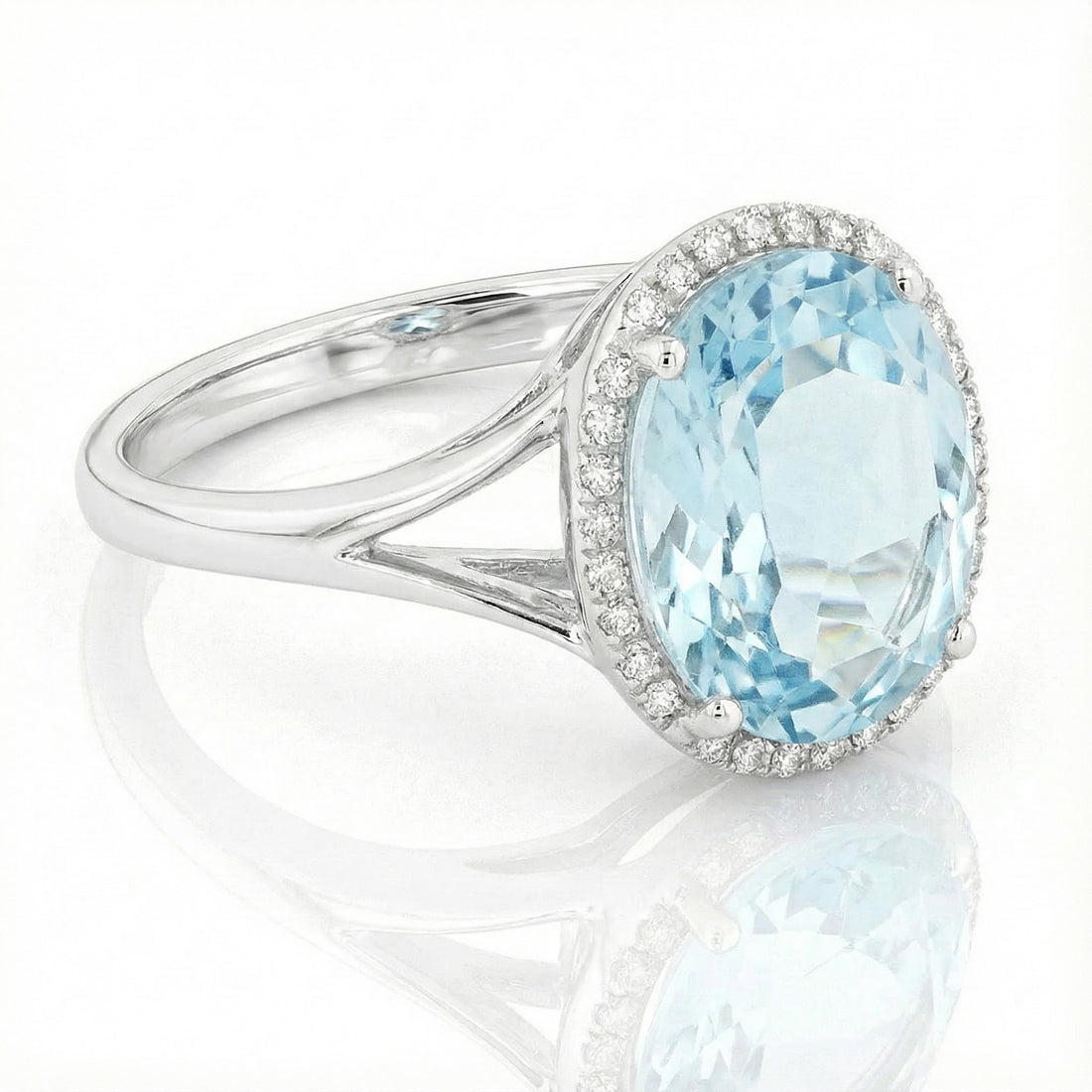 Madison L | Oval Blue Topaz & Diamond Halo Ring | 14K White Gold | Oval Gemstone Ring - Brownee Jewelers