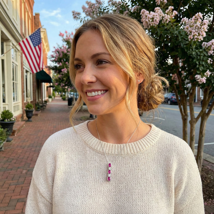 Le Vian® 14K Vanilla Gold® Passion Ruby® & Vanilla Diamond® Pendant This elegant Le Vian® pendant features a vertical trio of vivid 3/4 cts. Passion Ruby® in beautifully faceted oval cuts