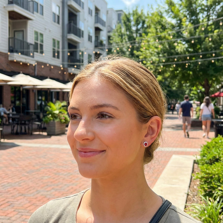 Oval Ruby Diamond Halo Stud Earrings | 10K White Gold | 0.13 ctw | Friction Back - Brownee Jewelers