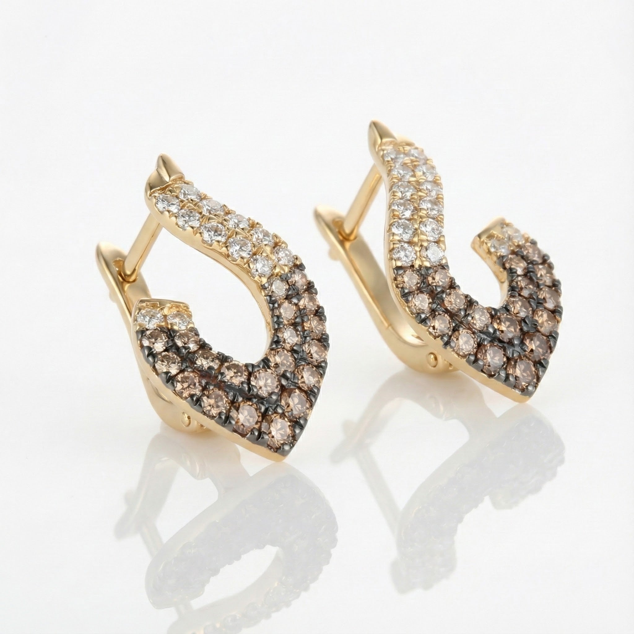 Le Vian® 14K Honey Gold™ Chocolate Ombré® Diamond Earrings (1 1/4 ctw) These sophisticated Le Vian® Ombre® earrings feature an elegant open teardrop silhouette adorned with 1 1/4 carats of Chocolate Ombré® Diamonds