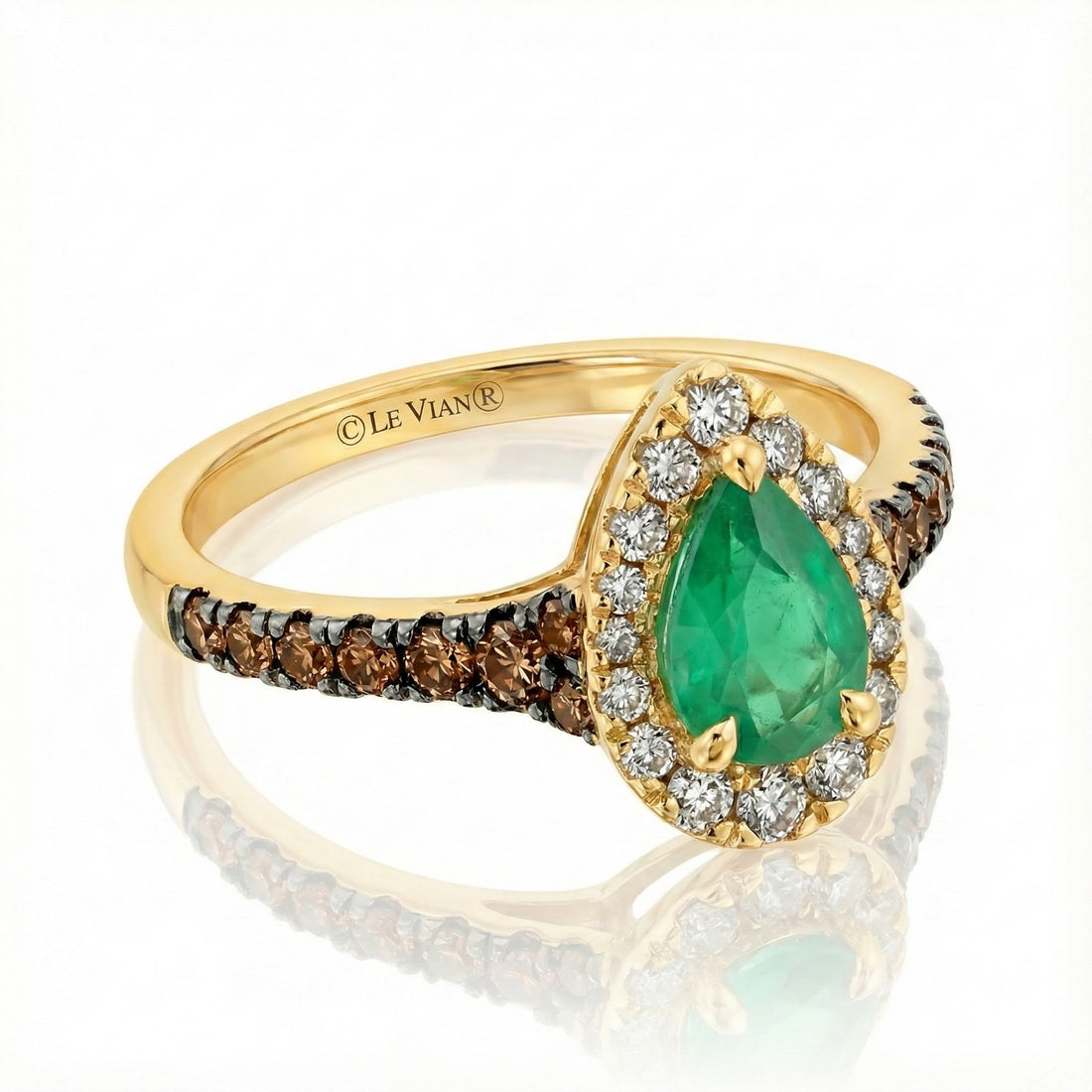 Le Vian® 14K Honey Gold™ Costa Smeralda Emerald™ Ring with Nude & Chocolate Diamonds® (0.95ctw) This captivating Le Vian® ring highlights a vivid 1/2 ct. Costa Smeralda Emerald™—a lush, vibrant green that takes center stage