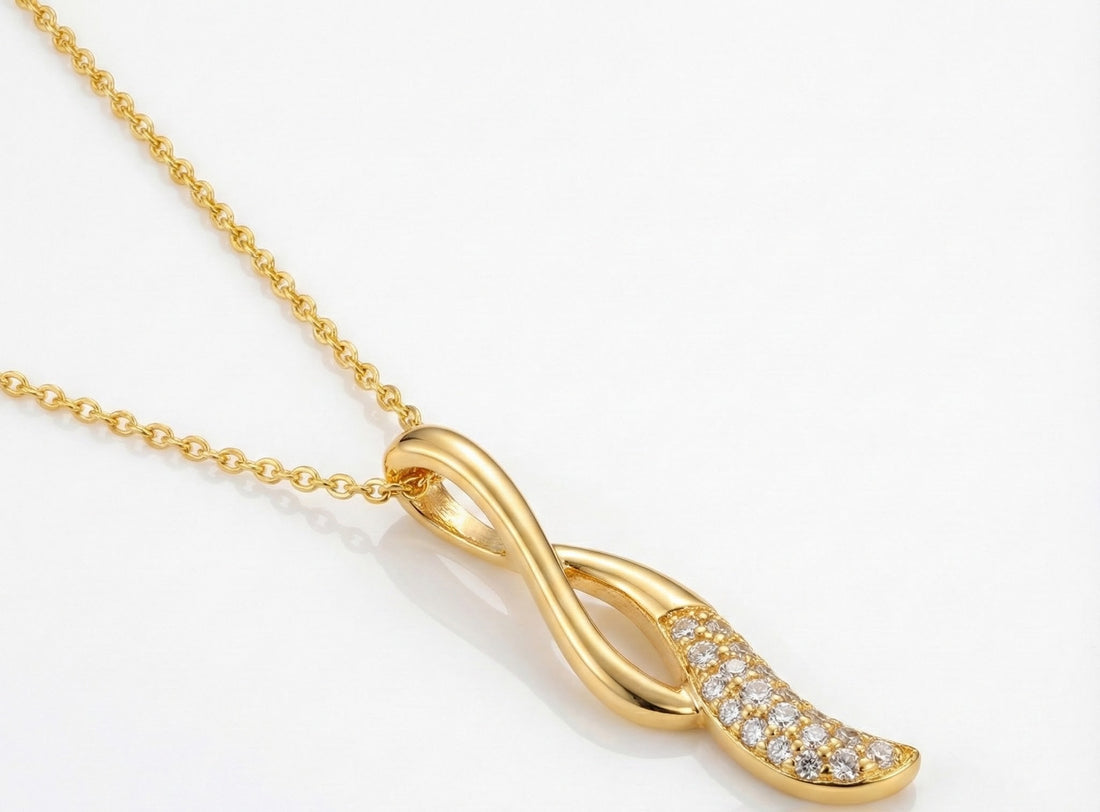 Le Vian® Nude Diamonds™ Pendant in 14K Honey Gold™ – 1/6ct Graceful, modern, and effortlessly elegant — this Le Vian® pendant features 1/6 cts. of sparkling Nude Diamonds™ arranged along a flowing, sculpted design