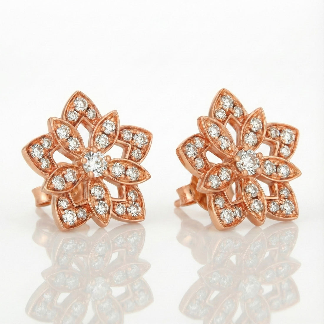 Le Vian® Nude Diamonds™ Floral Earrings – 14K Rose Gold Radiant and romantic, these exquisite Le Vian Nude Diamonds™ earrings feature an elegant floral design illuminated by a dazzling array of round white diamonds