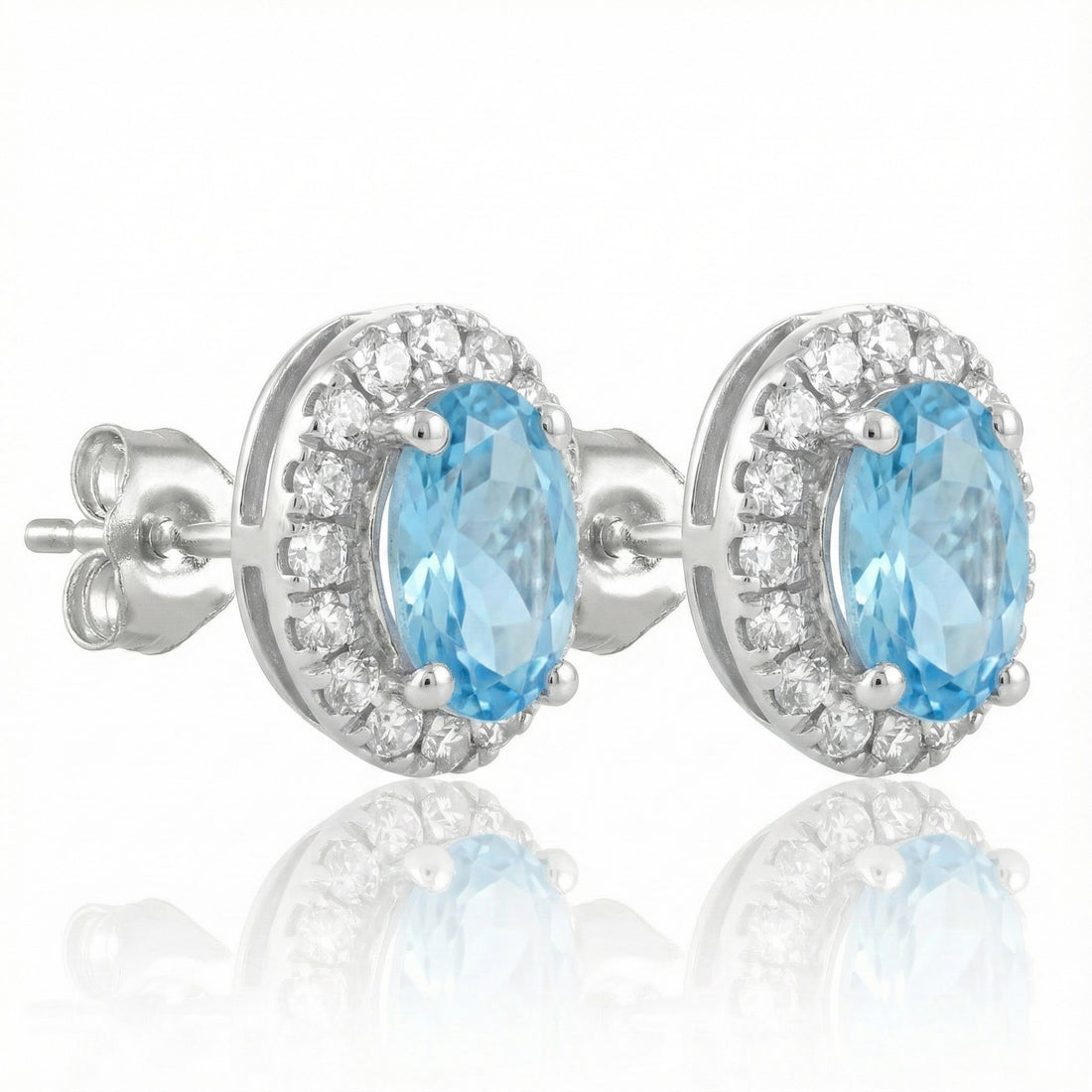 ASHI | Oval Aquamarine Diamond Halo Stud Earrings | 10K White Gold | 0.13 ctw | Friction Back - Brownee Jewelers