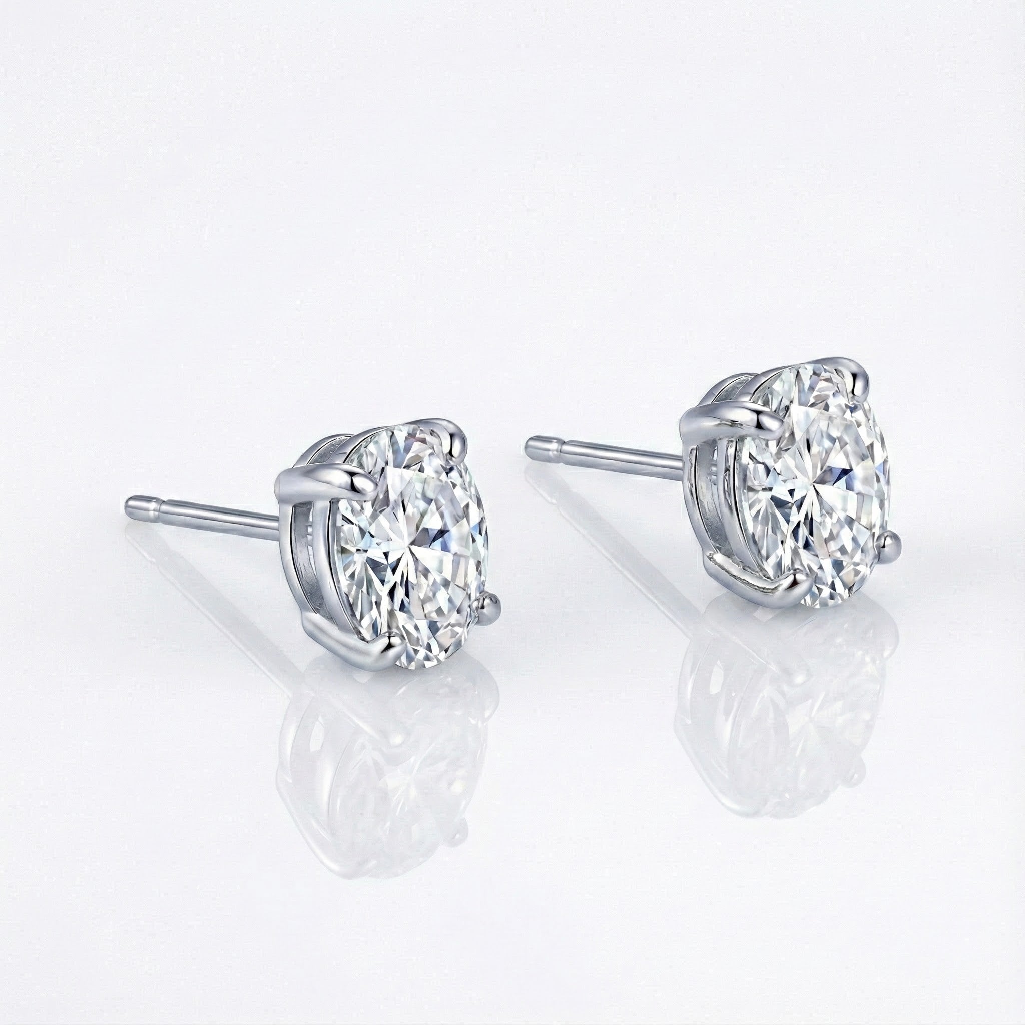 4 CTW Oval Solitaire Stud Earrings A timeless classic. These oval solitaire stud earrings are claw-set with Lafonn's signature Lassaire simulated diamonds in sterling silver bonded with platinum.