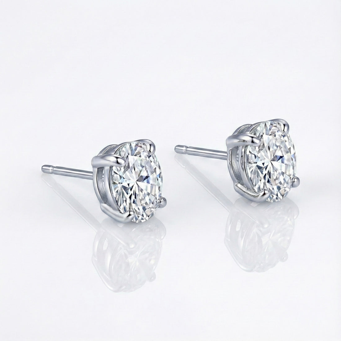 4 CTW Oval Solitaire Stud Earrings A timeless classic. These oval solitaire stud earrings are claw-set with Lafonn's signature Lassaire simulated diamonds in sterling silver bonded with platinum.