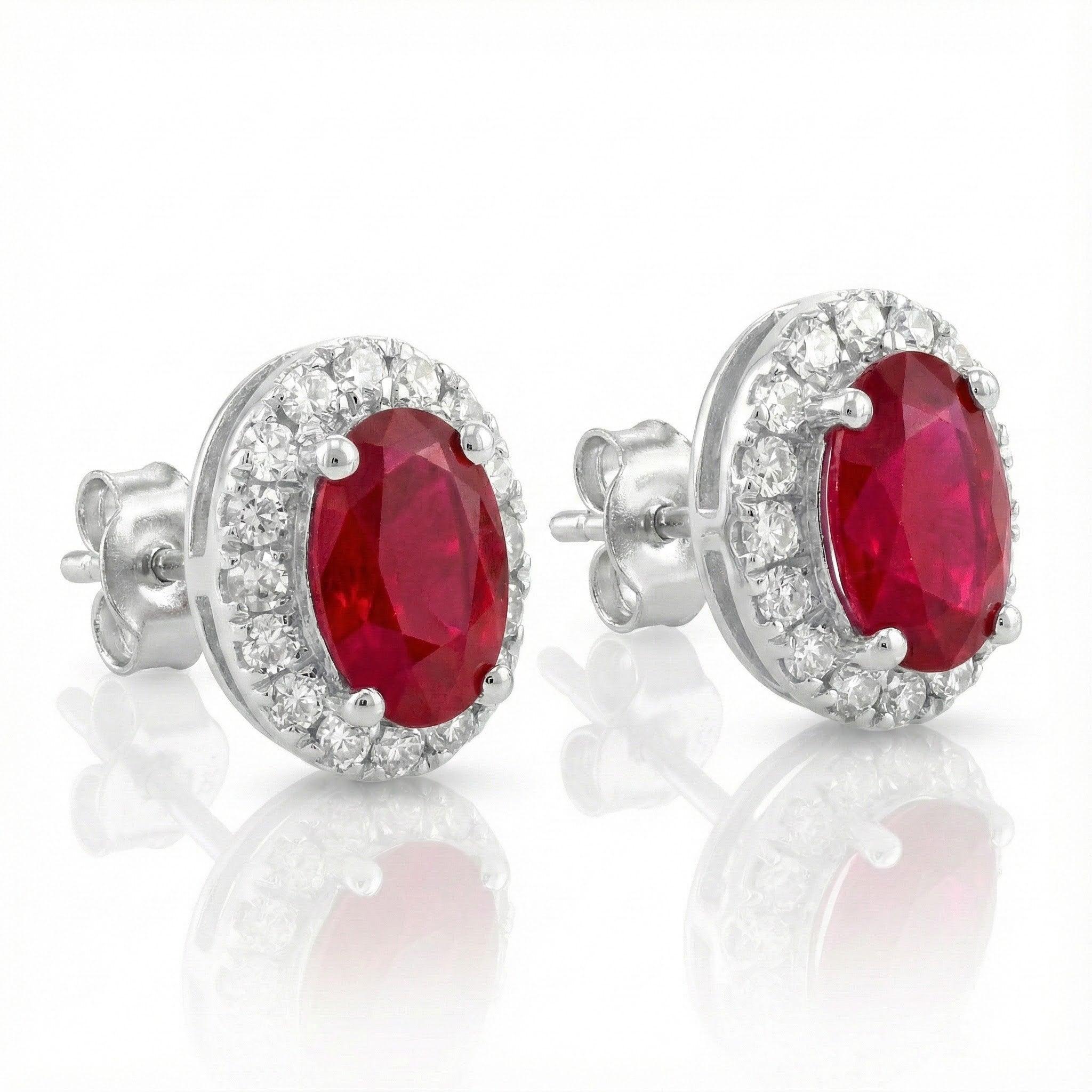 Oval Ruby Diamond Halo Stud Earrings | 10K White Gold | 0.13 ctw | Friction Back - Brownee Jewelers