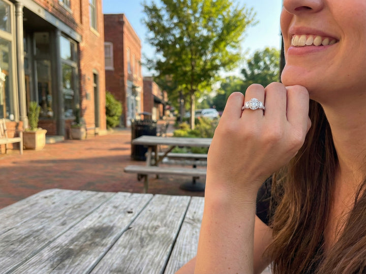 Oval Lab-Grown Diamond Three-Stone Halo Ring | 14K White Gold | 3.00 ct Center, 4.63 ctw | Oval Side Diamonds - Brownee Jewelers