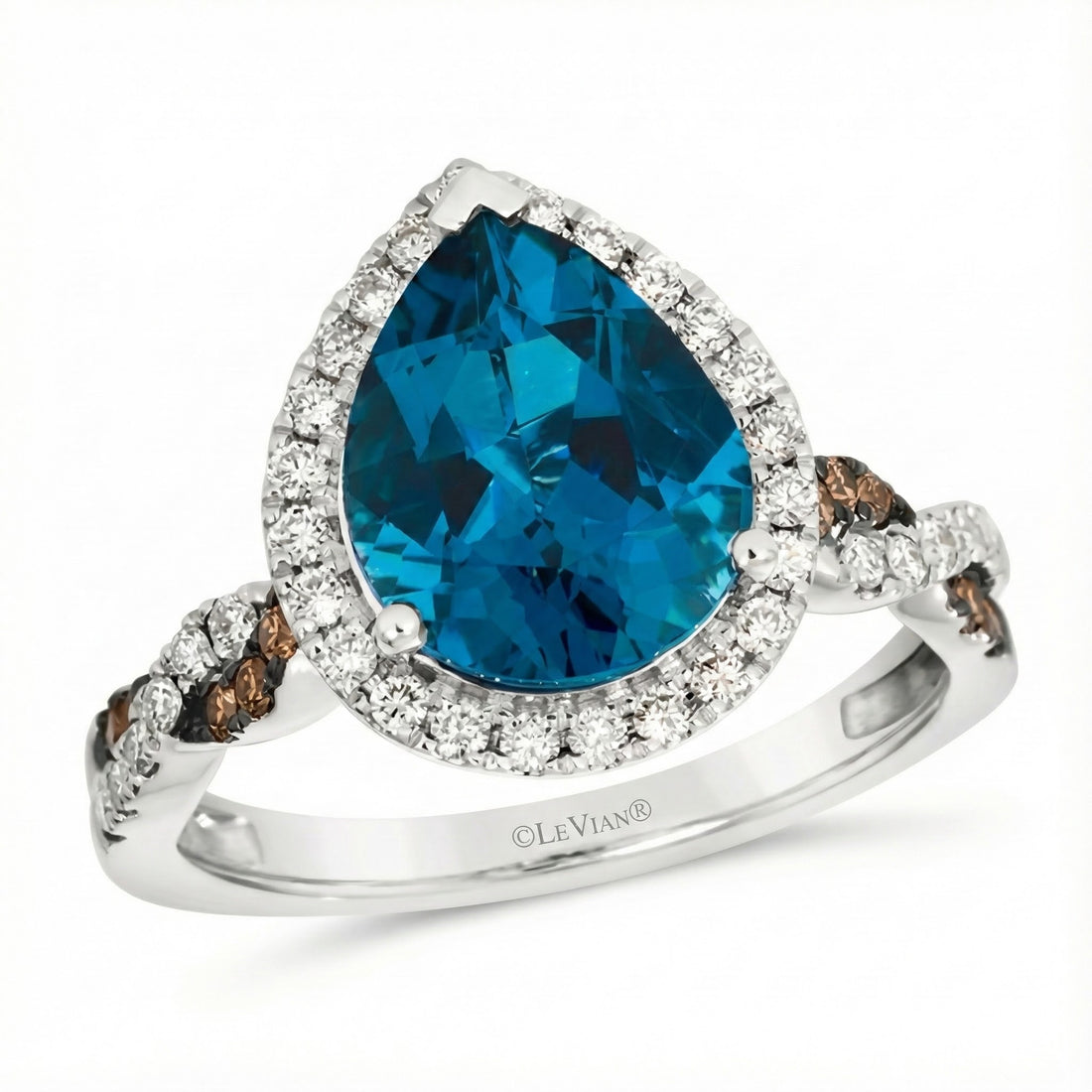 Le Vian® 14K Vanilla Gold® Deep Sea Blue Topaz™ & Diamond Halo Ring This breathtaking Le Vian® design showcases a bold 3.00 ct. Deep Sea Blue Topaz™ in a striking pear shape, radiating vivid ocean-blue brilliance