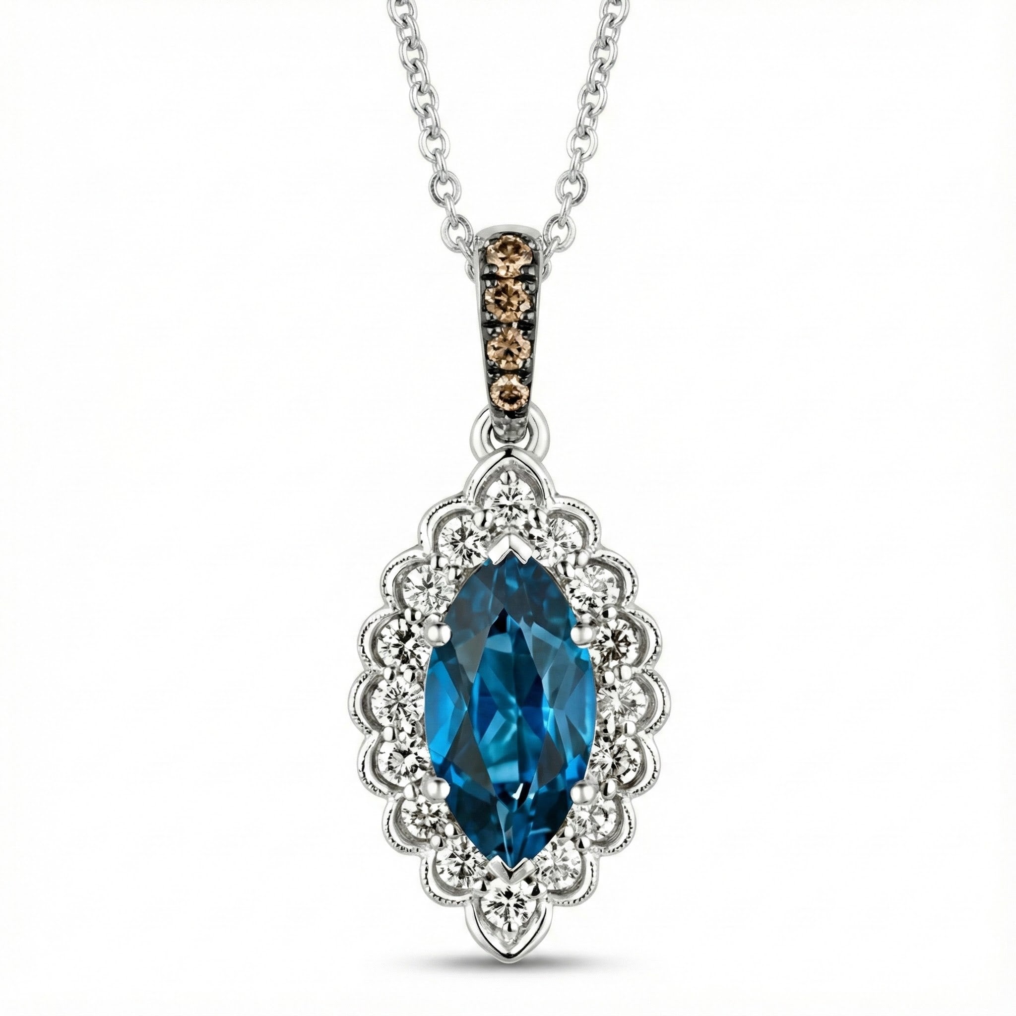 Le Vian® 14K Vanilla Gold® Deep Sea Blue Topaz™ & Nude/Chocolate Diamond® Pendant (1.25ctw) Elegant and eye-catching, this Le Vian® pendant showcases a brilliant 1 ct. Deep Sea Blue Topaz™ framed by 1/4 cts. of sparkling Nude Diamonds™ in a scalloped vintage-inspired halo