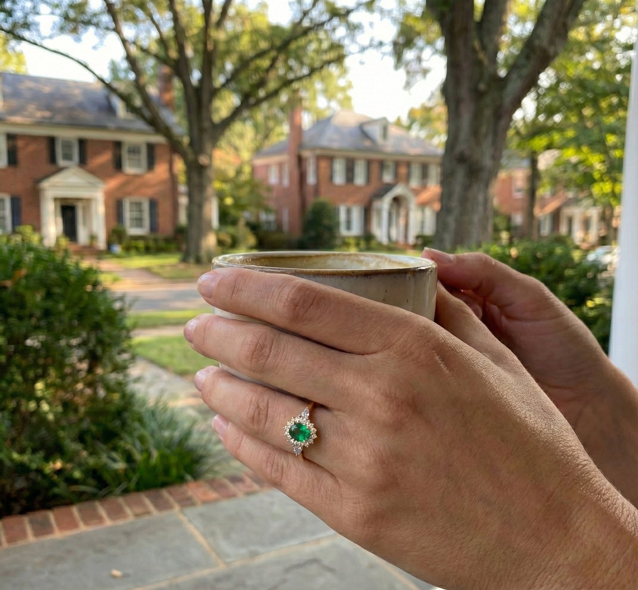 Oval Emerald & Lab-Grown Diamond Halo Ring | 1.50 ct Emerald | 0.40 ctw Diamonds | 10K Yellow Gold - Brownee Jewelers