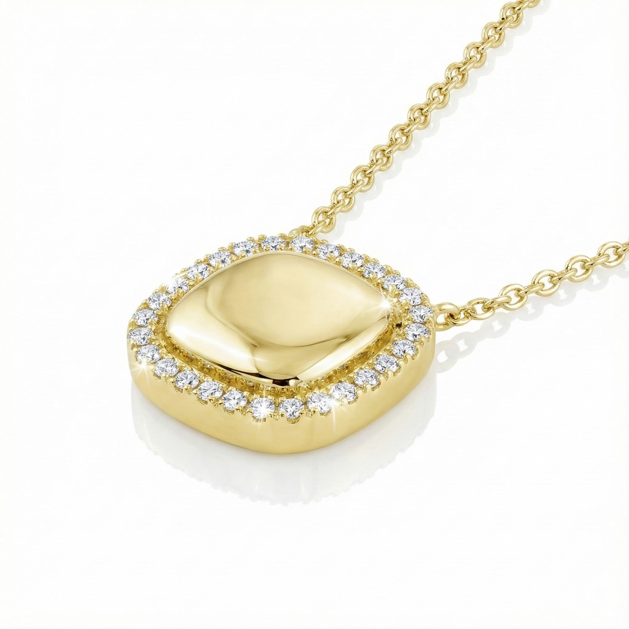 10K Yellow Gold Diamond Halo Cushion Pendant – 1/8ct Elevate your everyday style with this chic 10K yellow gold cushion pendant, framed by a sparkling 1/8 carat diamond halo. 0851443318 - Brownee Jewelers