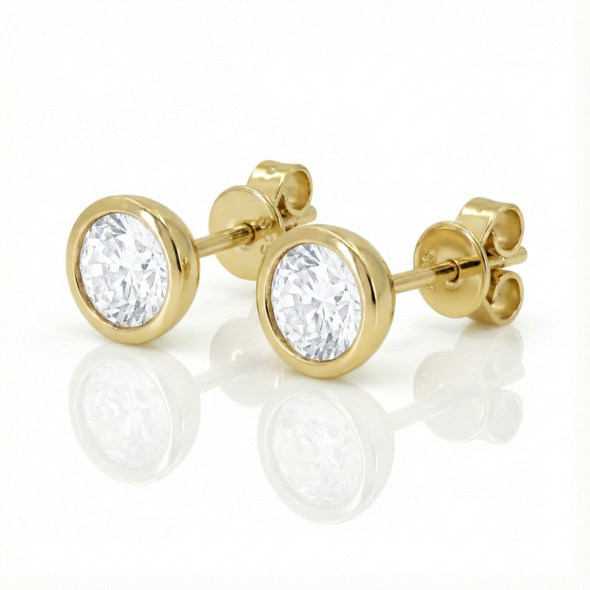 Madison L | White Topaz Bezel Stud Earrings | 14K Yellow Gold | Round Gemstone Studs | Classic Design - Brownee Jewelers