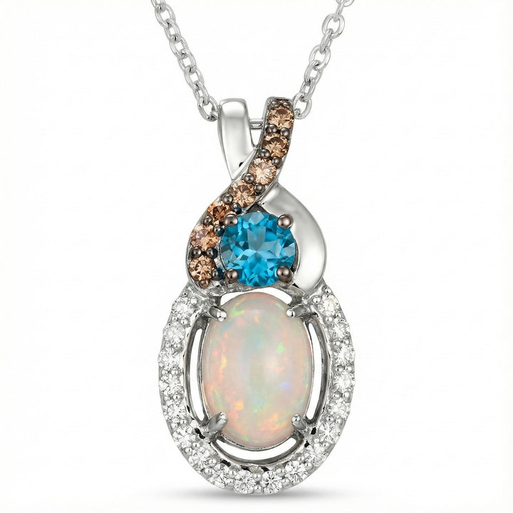Le Vian® 14K Vanilla Gold® Neopolitan Opal®, Deep Sea Blue Topaz™ & Diamond Pendant (0.71ctw) Colorful, elegant, and full of Le Vian® charm—this Chocolatier® pendant features a glowing 3/8 ct. Neopolitan Opal®, paired with a vibrant 1/6 ct. Deep Sea Blue Topaz™ for a striking pop of color.