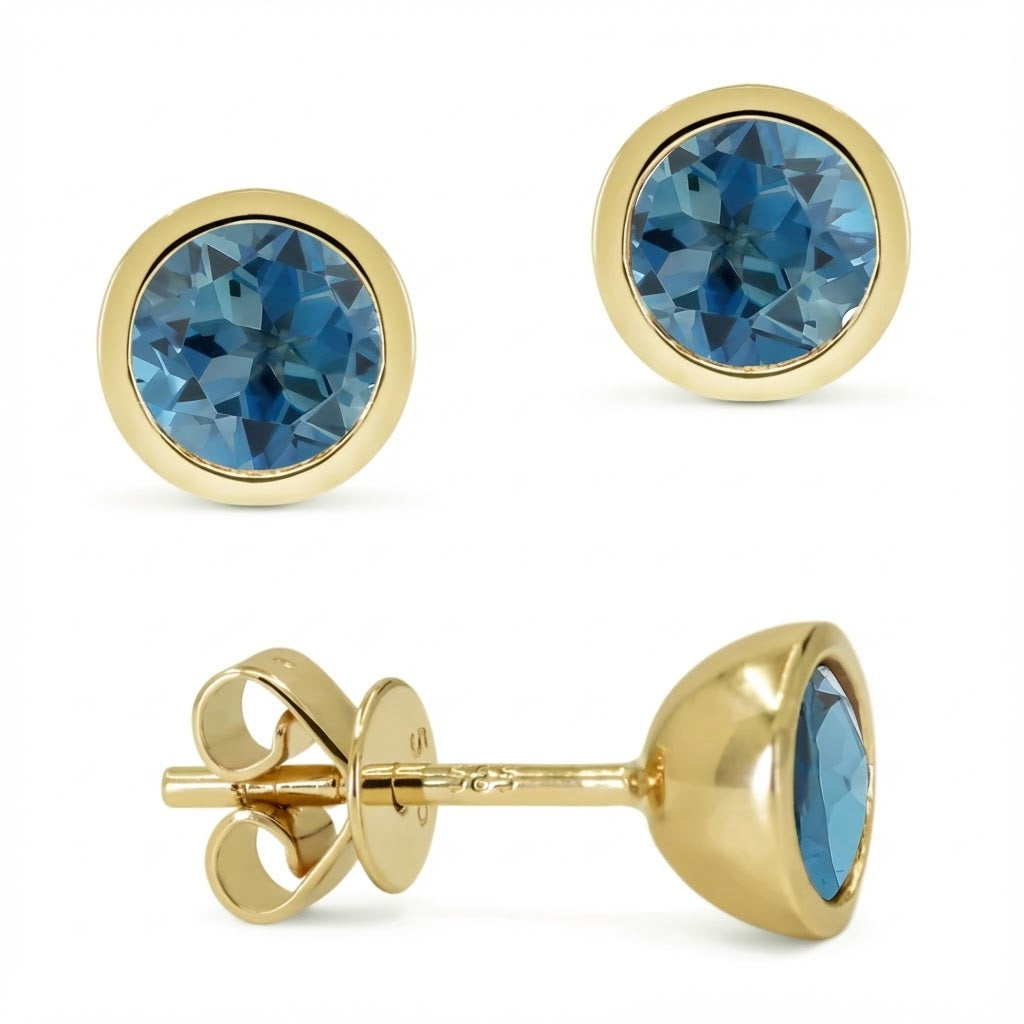 Madison L | Blue Topaz Stud Earrings | 14K Yellow Gold | Bezel-Set Round Gemstone Studs - Brownee Jewelers