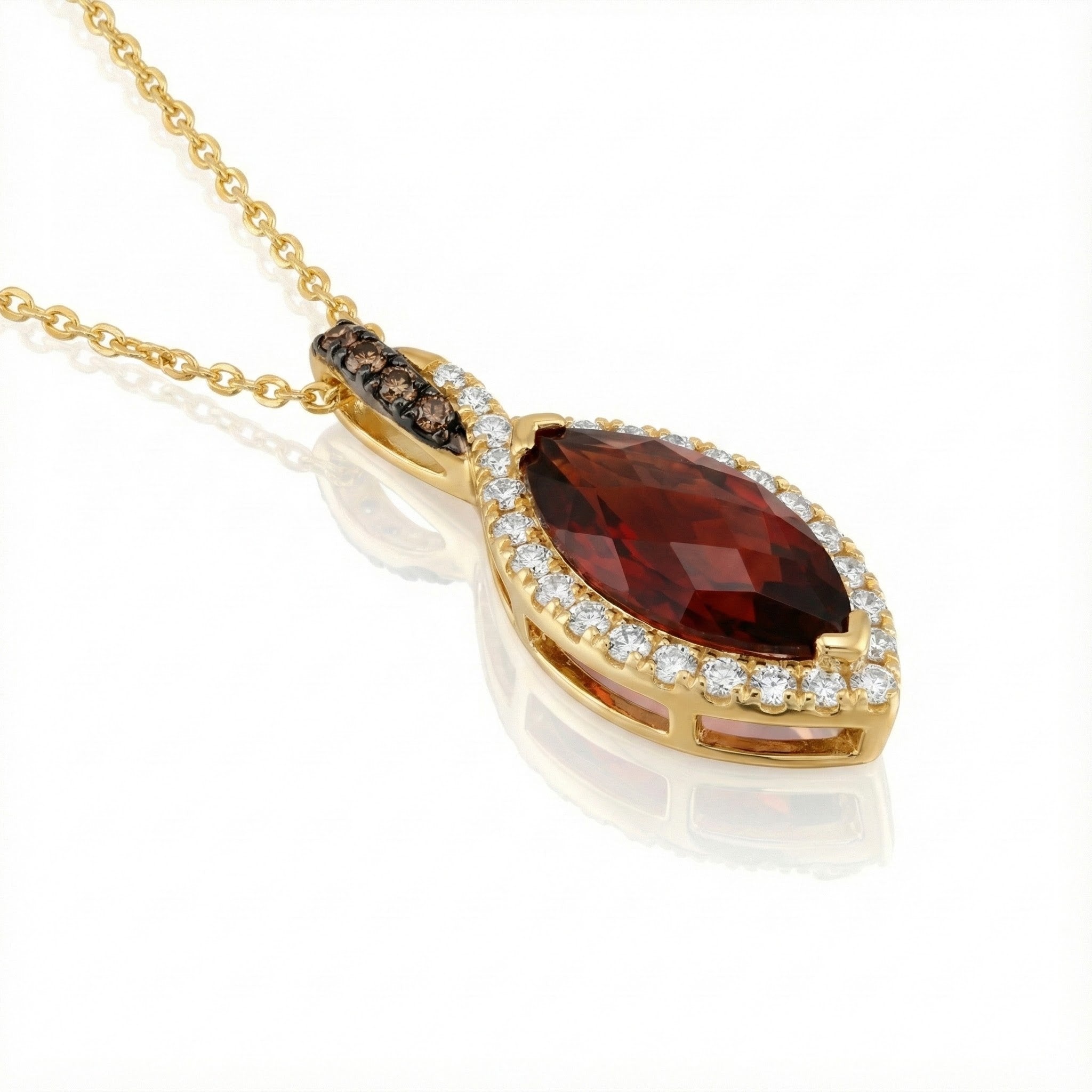 Le Vian® Pomegranate Garnet™ & Diamond Pendant in 14K Honey Gold™ Rich, vibrant, and irresistibly elegant — this Le Vian® pendant showcases a stunning 2 ct. Pomegranate Garnet™, cut in a marquise shape to maximize its deep red glow