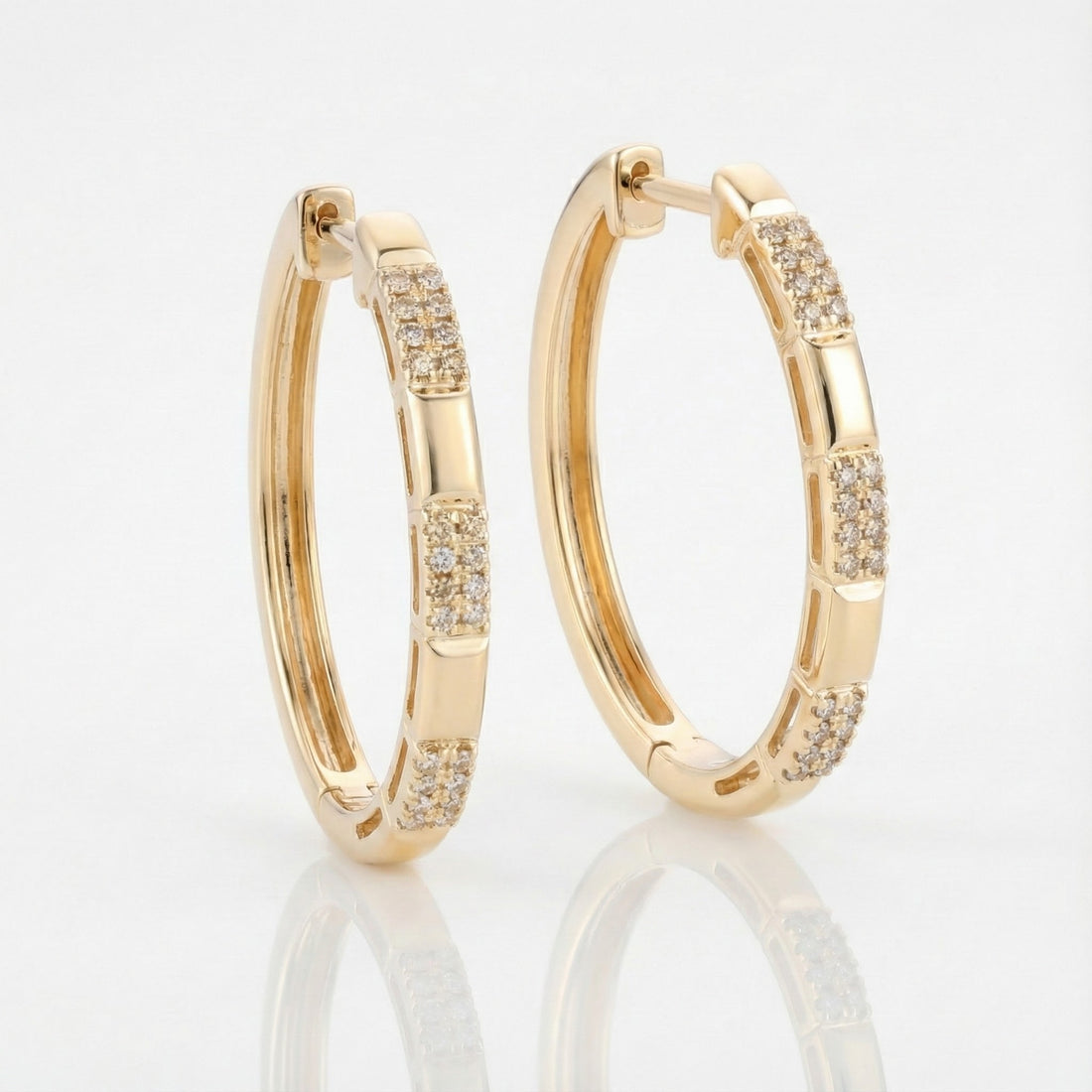 Le Vian® 14K Honey Gold™ Nude Diamond™ Hoop Earrings (1/4 ctw) These elegant Le Vian® hoops feature 1/4 carat of Nude Diamonds™ arranged in sparkling three-station clusters along warm 14K Honey Gold™