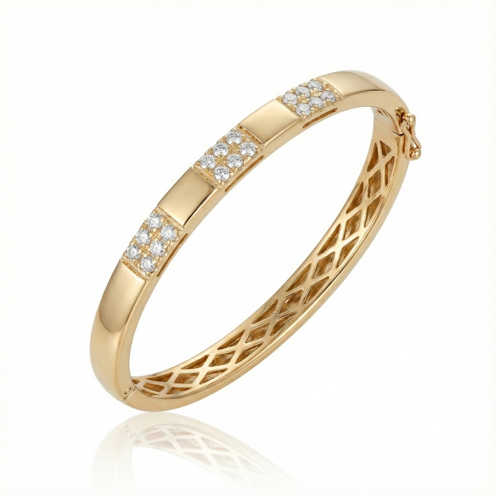 Le Vian® 14K Honey Gold™ Nude Diamond™ Bangle (1/2 ctw) This elegant Le Vian® bangle showcases 1/2 carat of Nude Diamonds™ arranged in three shimmering diamond-accented stations.